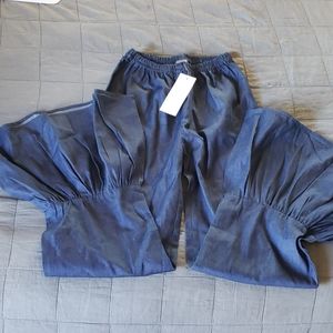 Wide leg ruffle bottom denim colored pants